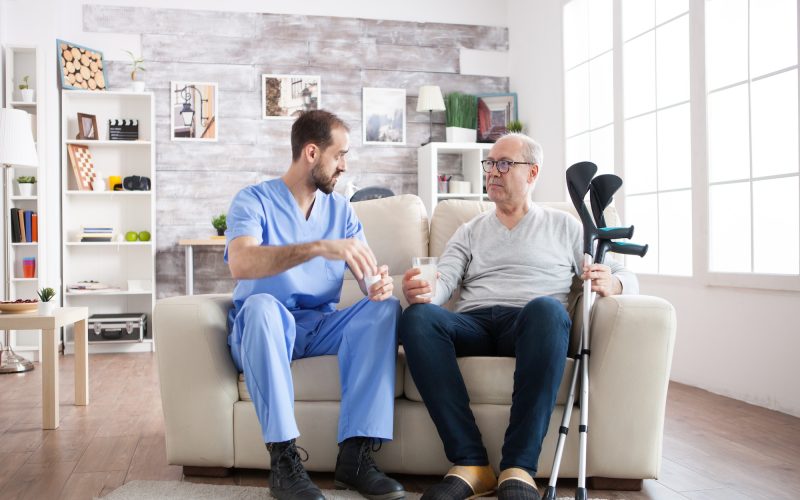 young-male-nurse-in-nursing-home-with-pills-for-senior-man.jpg young-male-nurse-in-nursing-home-with-pills-for-senior-man.jpg